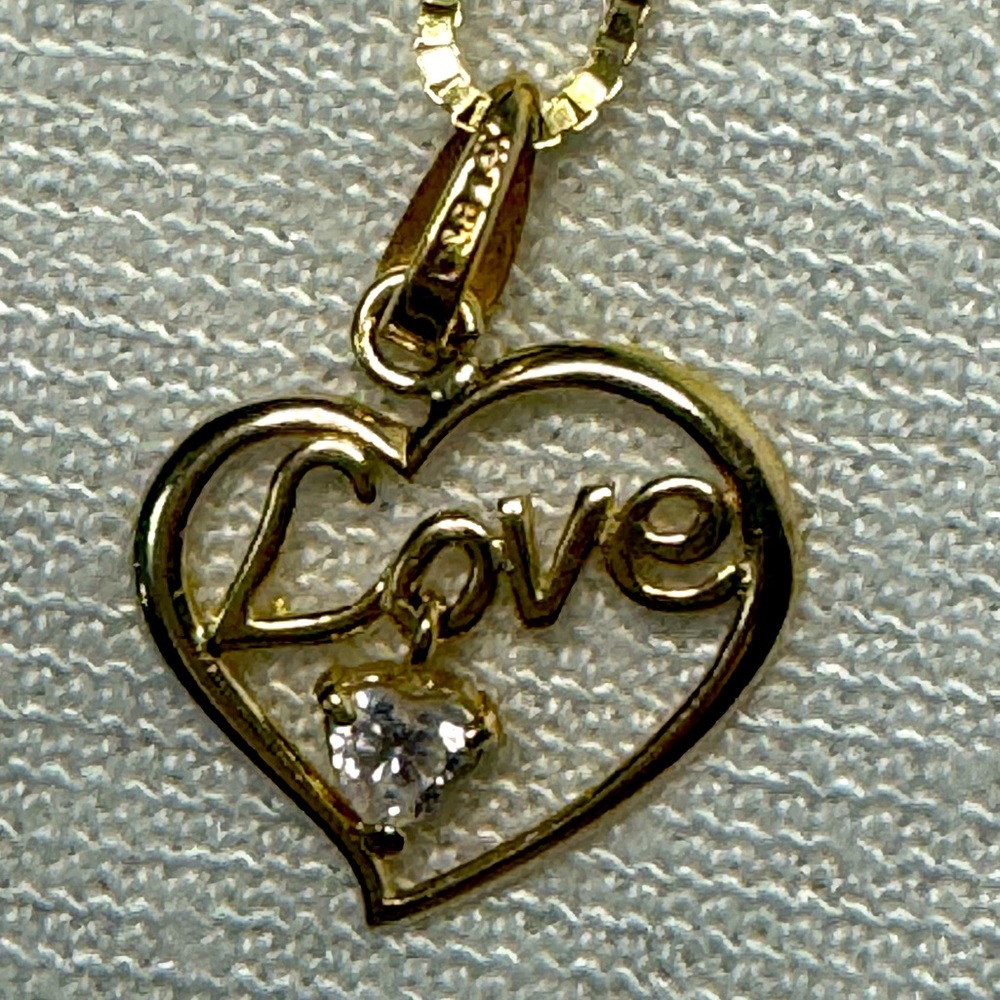 Pagoda used 10k chain and 14K heart pendant